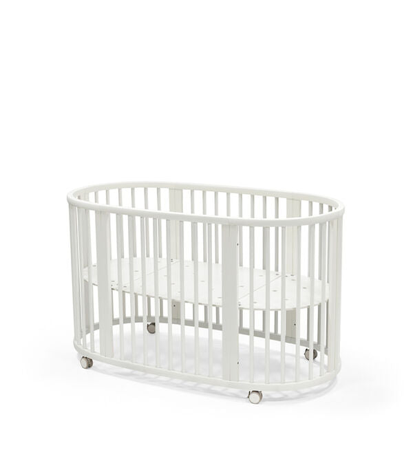 Stokke Sleepi V3 Bed Oval Wooden Crib with Adjustable Mattress Levels, Sturdy Beech Frame, Curved Edges, Wheels for Gentle Rocking, Safe