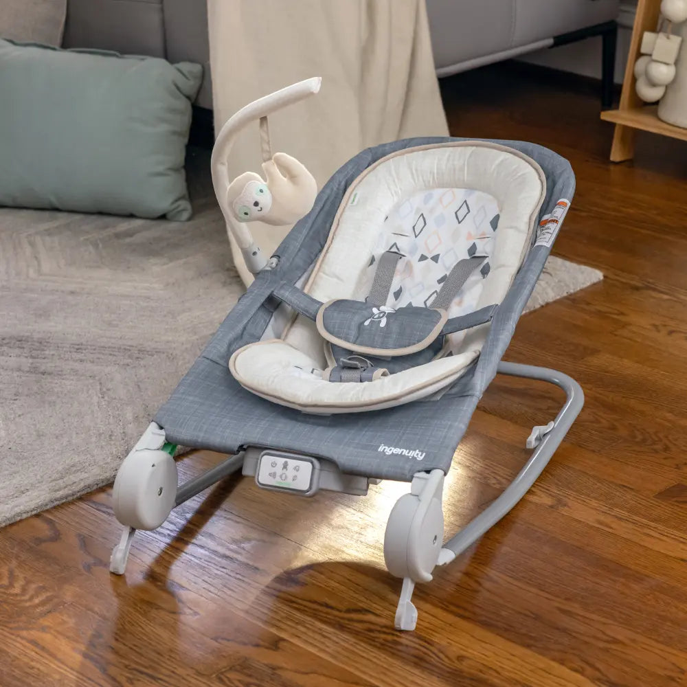 Ingenuity Happy Belly Rock-to-Bounce Baby Massage Seat with Soothing Vibrations, Music &amp; Belly Massage Technology, 0-6 months, Parker