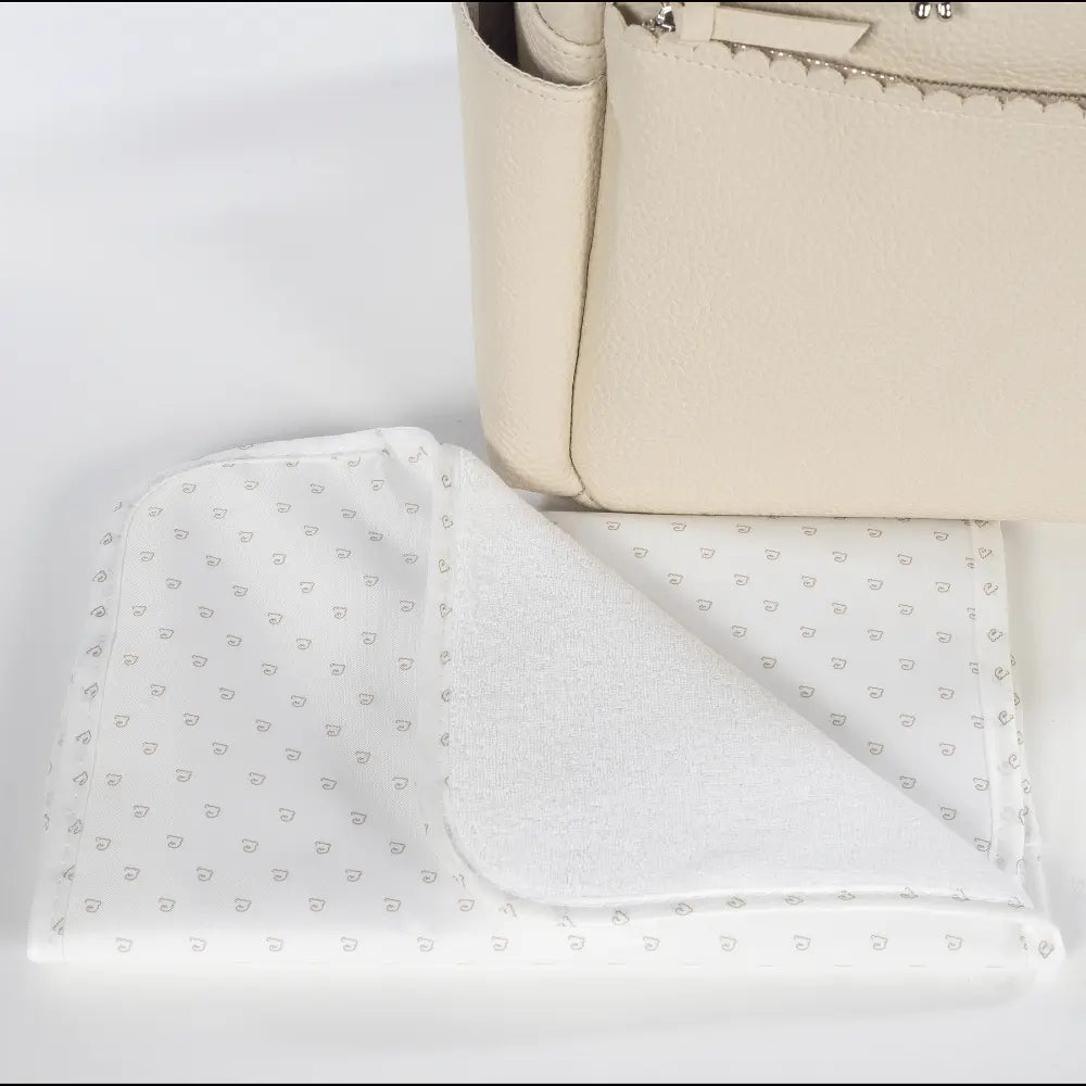 Pasito a Pasito Diaper Backpack with Changing Pad, Large Capacity Water-Resistant with Multi-Pocket Organizer, Insulated Bottle Pocket, Shoulder &amp; Stroller Straps, Icon Eco Leather - Cream