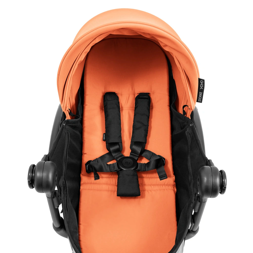 Stokke YOYO⁵ Newborn Pack | Fully Flat Newborn Seat | Newborn Stroller Attachment | 0–6 Months | Lightweight &amp; Compact | 5-Point Safety Harness | Ventilation Windows | Peach