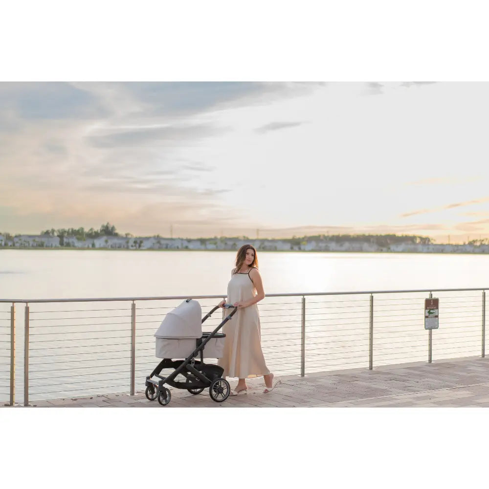UPPAbaby Newborn Foldable Bassinet V3, Flat Recline, Stroller Carry Cot, Includes Breathable Mattress, For Kona, Cruz, Vista Stroller -  Ada/Sandstone