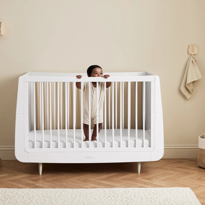 SnuzKot Convertible Cot &amp; Bed from Birth to 4 Years - Adjustable 3 Height Settings, Includes Mattress, Safe and Durable Wooden Crib with Breathable Airflow Design - White
