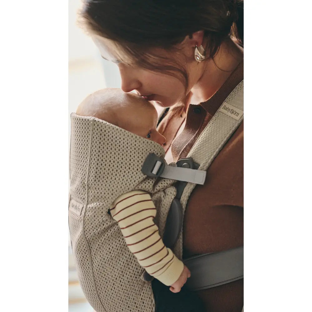 BabyBjorn Mini Baby Carrier, Soft &amp; Lightweight Mesh Fabric, 3 Carrying Positions, Ergonomic Hip and Head Support, Adjustable Waistbelt &amp; Cross Straps, Easy to Use, Birth to 12 Months (upto 11kg) - Grey Beige