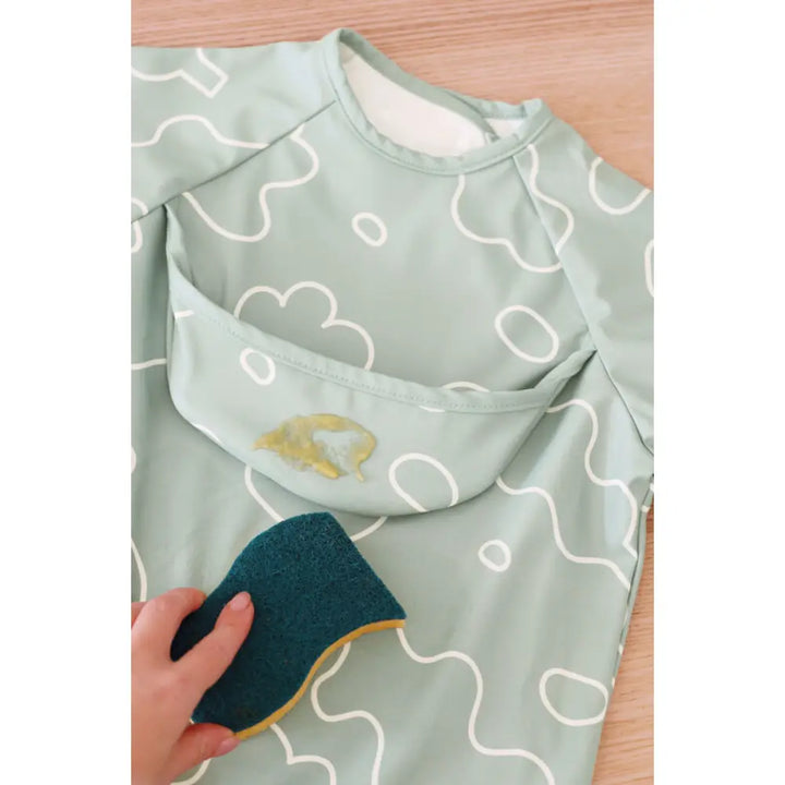 Beaba 2-in-1 Waterproof Bib with Detachable Sleeves, Foldable Food Catcher Pocket, Adjustable Snap Fit &amp; Elastic Cuffs, Soft &amp; Easy-Clean Bib for Feeding &amp; Activities, 4M+