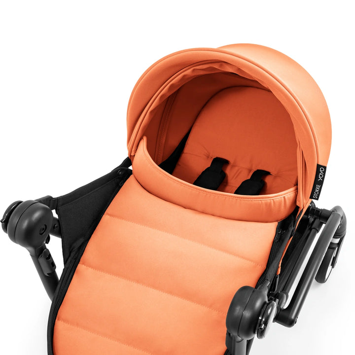 Stokke YOYO⁵ Newborn Pack | Fully Flat Newborn Seat | Newborn Stroller Attachment | 0–6 Months | Lightweight &amp; Compact | 5-Point Safety Harness | Ventilation Windows | Peach