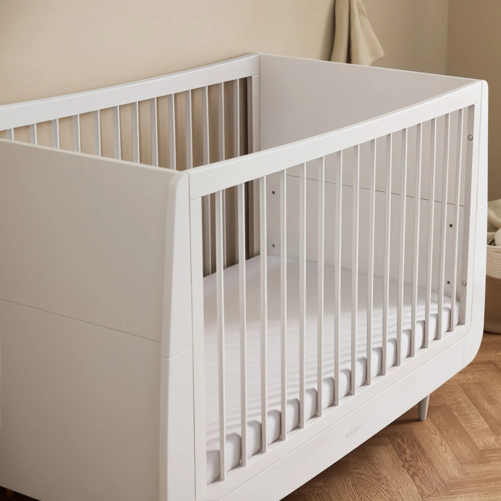 SnuzKot Convertible Cot &amp; Bed from Birth to 4 Years - Adjustable 3 Height Settings, Includes Mattress, Safe and Durable Wooden Crib with Breathable Airflow Design - White