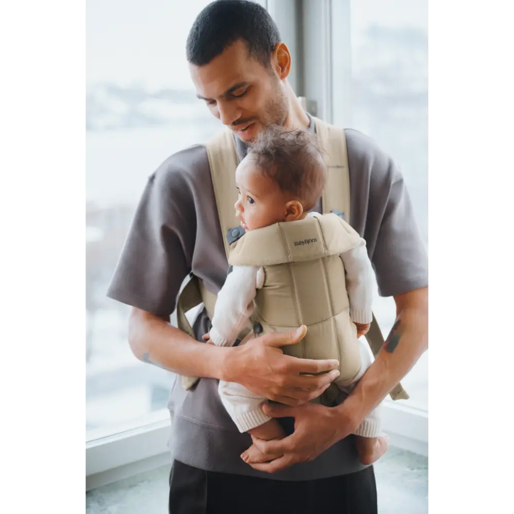 BabyBjorn Mini Baby Carrier (Woven), Soft &amp; Lightweight Fabric, 3 Carrying Positions, Ergonomic “M” Position and Head Support, Adjustable Waistbelt &amp; Cross Straps, Easy to Use, Birth to 12 Months (upto 11kg) - Beige