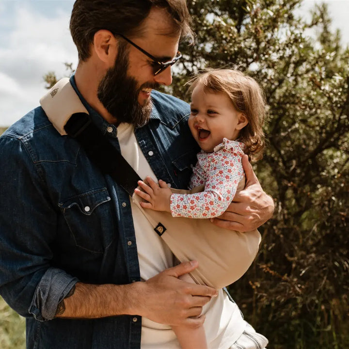 Wildride Toddler Carrier | Lightweight 100% Cotton Hip Seat Baby Carrier for Toddlers 9 Months–4 Years | Ergonomic, Portable &amp; Travel-Friendly Child Carrier | Comfortable Alternative to Stroller for Everyday Use - Beige
