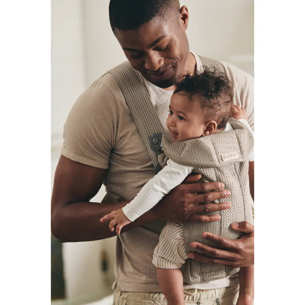 BabyBjorn Mini Baby Carrier, Soft &amp; Lightweight Mesh Fabric, 3 Carrying Positions, Ergonomic Hip and Head Support, Adjustable Waistbelt &amp; Cross Straps, Easy to Use, Birth to 12 Months (upto 11kg) - Grey Beige