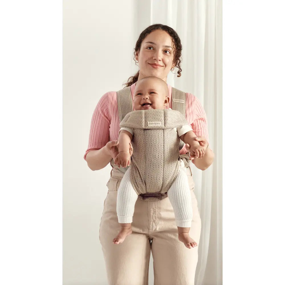 BabyBjorn Mini Baby Carrier, Soft &amp; Lightweight Mesh Fabric, 3 Carrying Positions, Ergonomic Hip and Head Support, Adjustable Waistbelt &amp; Cross Straps, Easy to Use, Birth to 12 Months (upto 11kg) - Grey Beige