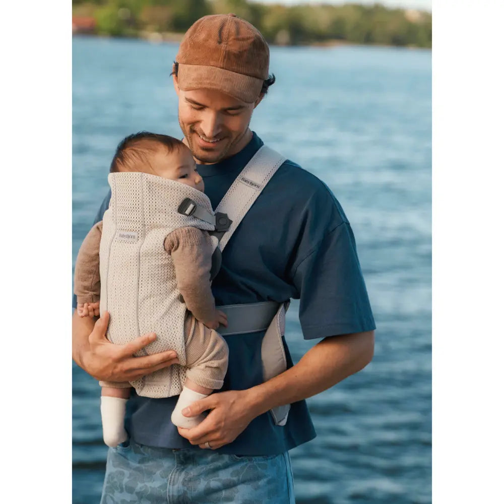 BabyBjorn Mini Baby Carrier, Soft &amp; Lightweight Mesh Fabric, 3 Carrying Positions, Ergonomic Hip and Head Support, Adjustable Waistbelt &amp; Cross Straps, Easy to Use, Birth to 12 Months (upto 11kg) - Cream