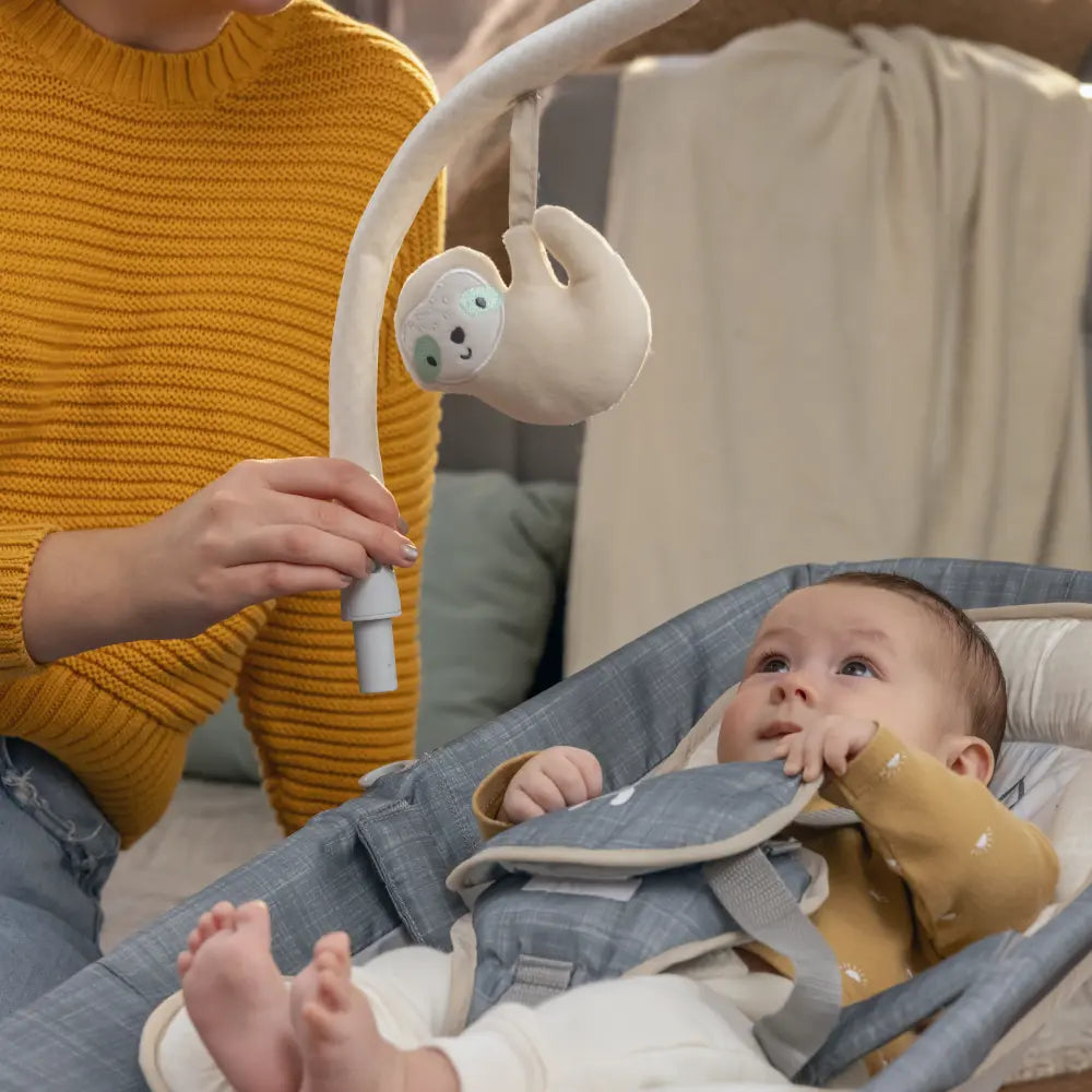 Ingenuity Happy Belly Rock-to-Bounce Baby Massage Seat with Soothing Vibrations, Music &amp; Belly Massage Technology, 0-6 months, Parker