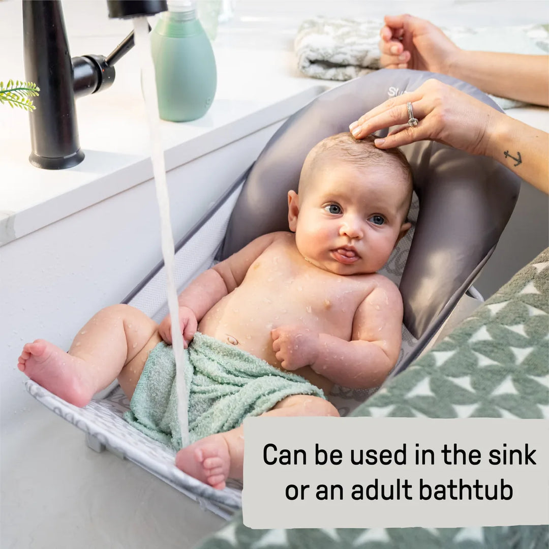 Ingenuity FoldAway 2-Position Baby Bath Bather with Mesh Sling &amp; Headrest, 0–6 Months /  Upto 9 kgs - Grey