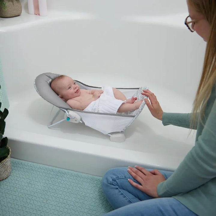 Ingenuity FoldAway 2-Position Baby Bath Bather with Mesh Sling &amp; Headrest, Grey, 0–6 Months (Upto 9 kgs)
