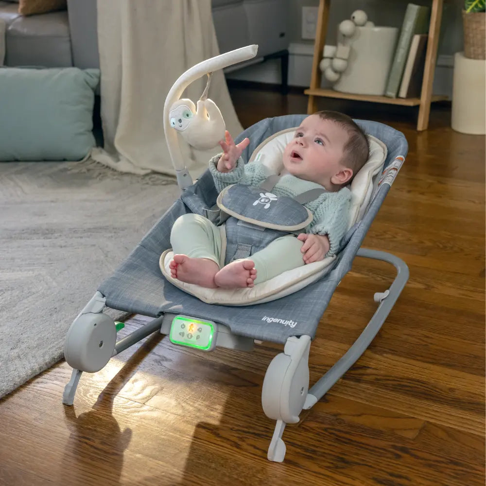 Ingenuity Happy Belly Rock-to-Bounce Baby Massage Seat with Soothing Vibrations, Music &amp; Belly Massage Technology, 0-6 months, Parker