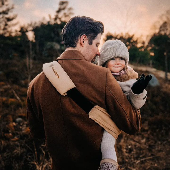 Wildride Toddler Carrier | Lightweight 100% Cotton Hip Seat Baby Carrier for Toddlers 9 Months–4 Years | Ergonomic, Portable &amp; Travel-Friendly Child Carrier | Comfortable Alternative to Stroller for Everyday Use - Beige