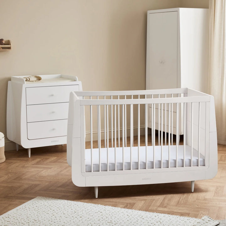SnuzKot Convertible Cot &amp; Bed from Birth to 4 Years - Adjustable 3 Height Settings, Includes Mattress, Safe and Durable Wooden Crib with Breathable Airflow Design - White
