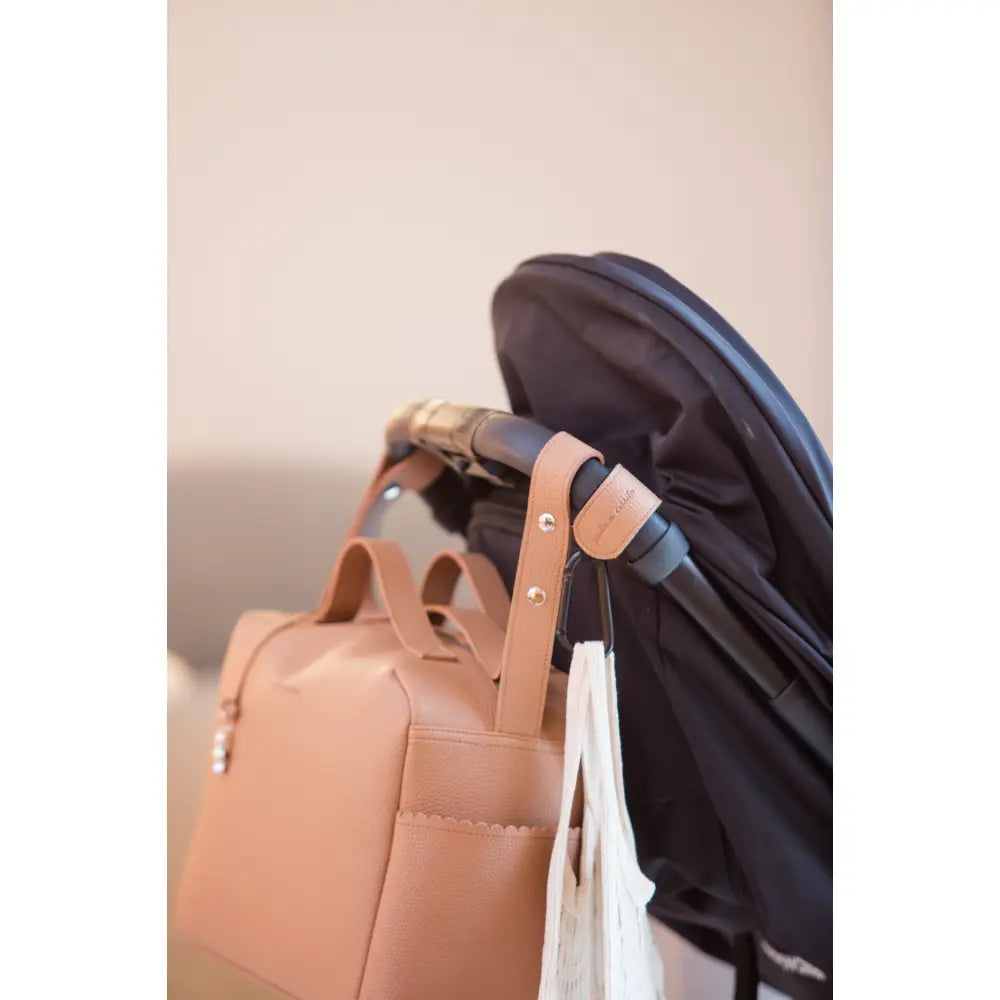 Pasito a Pasito Diaper Bag with Changing Mat, Large Capacity Water-Resistant Bag with Multi-Pocket Organizer, Insulated Bottle Pocket, Shoulder &amp; Stroller Straps, Icon Eco Leather - Caramel