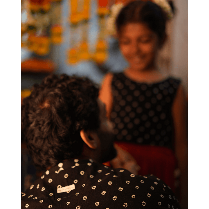 Love the World Today Laddoo Cotton Black Bandhani Top With Checkered Lehenga Set- Girls