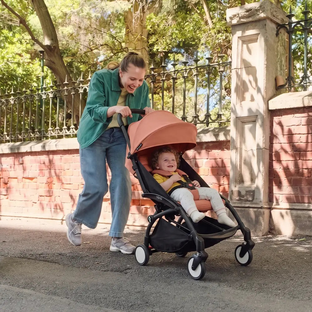 Stokke YOYO3 Stroller | Lightweight Compact Travel Stroller for Babies | Cabin Friendly &amp; Foldable | UPF 50+ Sun Protection | 5 Point Safety Harness | Award Winning Design | YOYO Stroller India | 6 Months to 4 Years - Black/Ginger