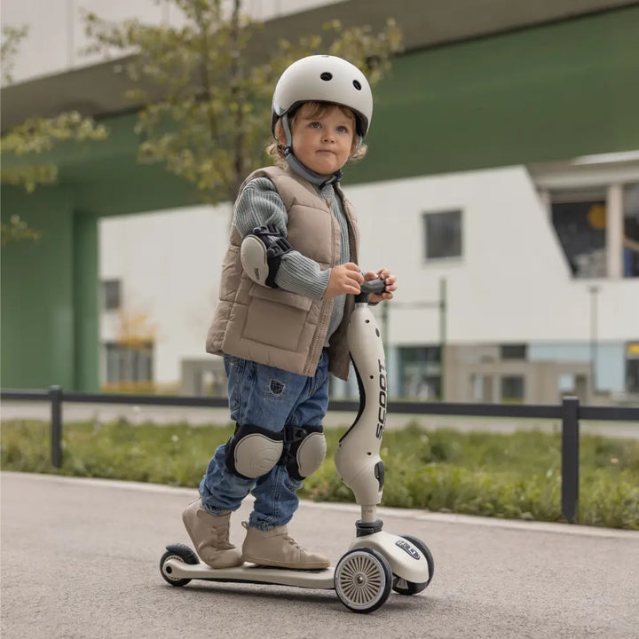 Scoot &amp; Ride Highwaykick 1 Kids Scooter with Helmet &amp; Protective Gear Set | Convertible Ride-On Scooter with Adjustable Helmet, Knee &amp; Elbow Pads | Ideal for Toddlers &amp; Kids - Ash
