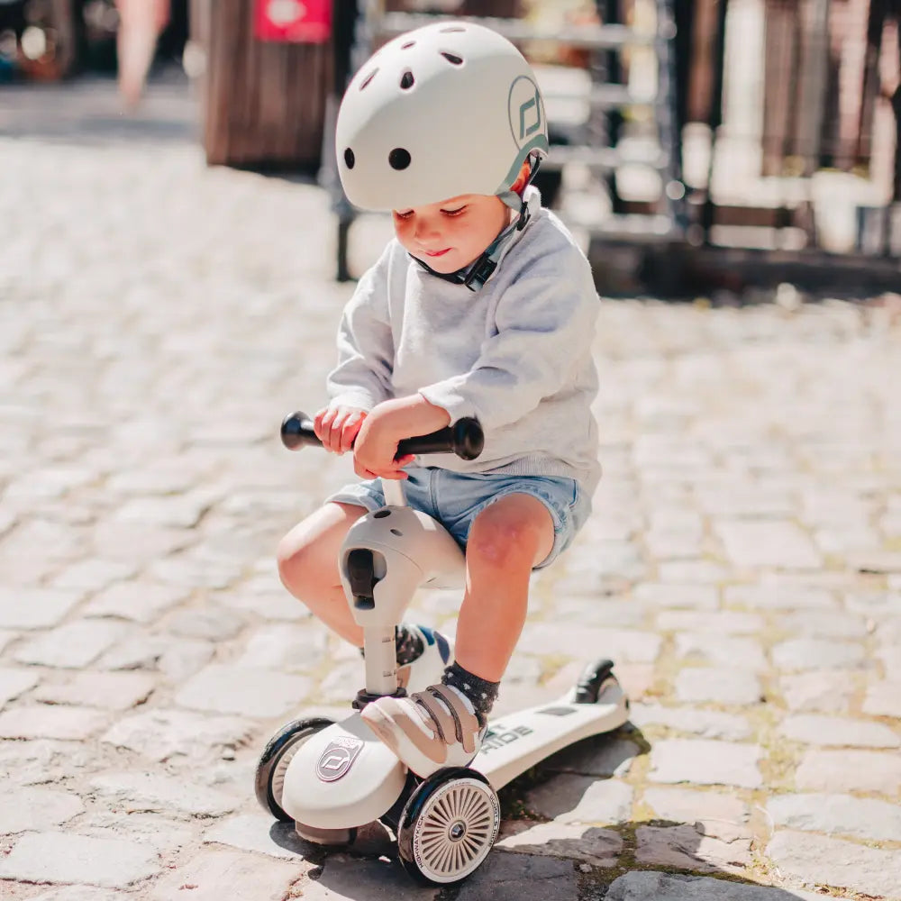 Scoot &amp; Ride Highwaykick 1 Kids Scooter with Helmet &amp; Protective Gear Set | Convertible Ride-On Scooter with Adjustable Helmet, Knee &amp; Elbow Pads | Ideal for Toddlers &amp; Kids - Ash