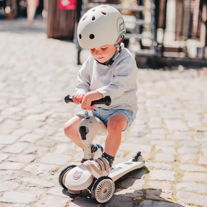 Scoot &amp; Ride Highwaykick 1 Kids Scooter with Helmet &amp; Protective Gear Set | Convertible Ride-On Scooter with Adjustable Helmet, Knee &amp; Elbow Pads | Ideal for Toddlers &amp; Kids - Ash
