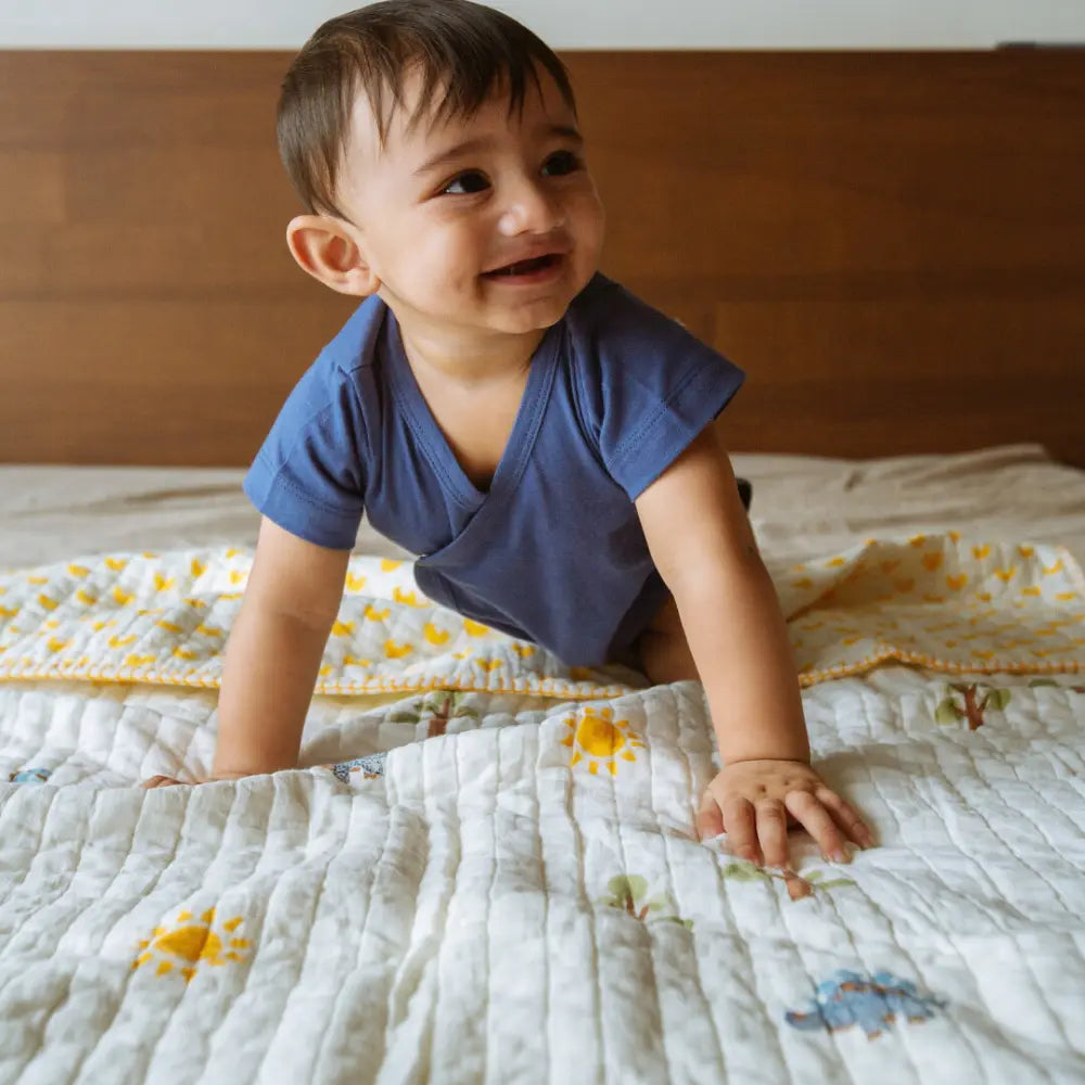 Dulaar Reversible Mulmul Quilt | Hand-Block Printed - A Day with Dinos (OG)