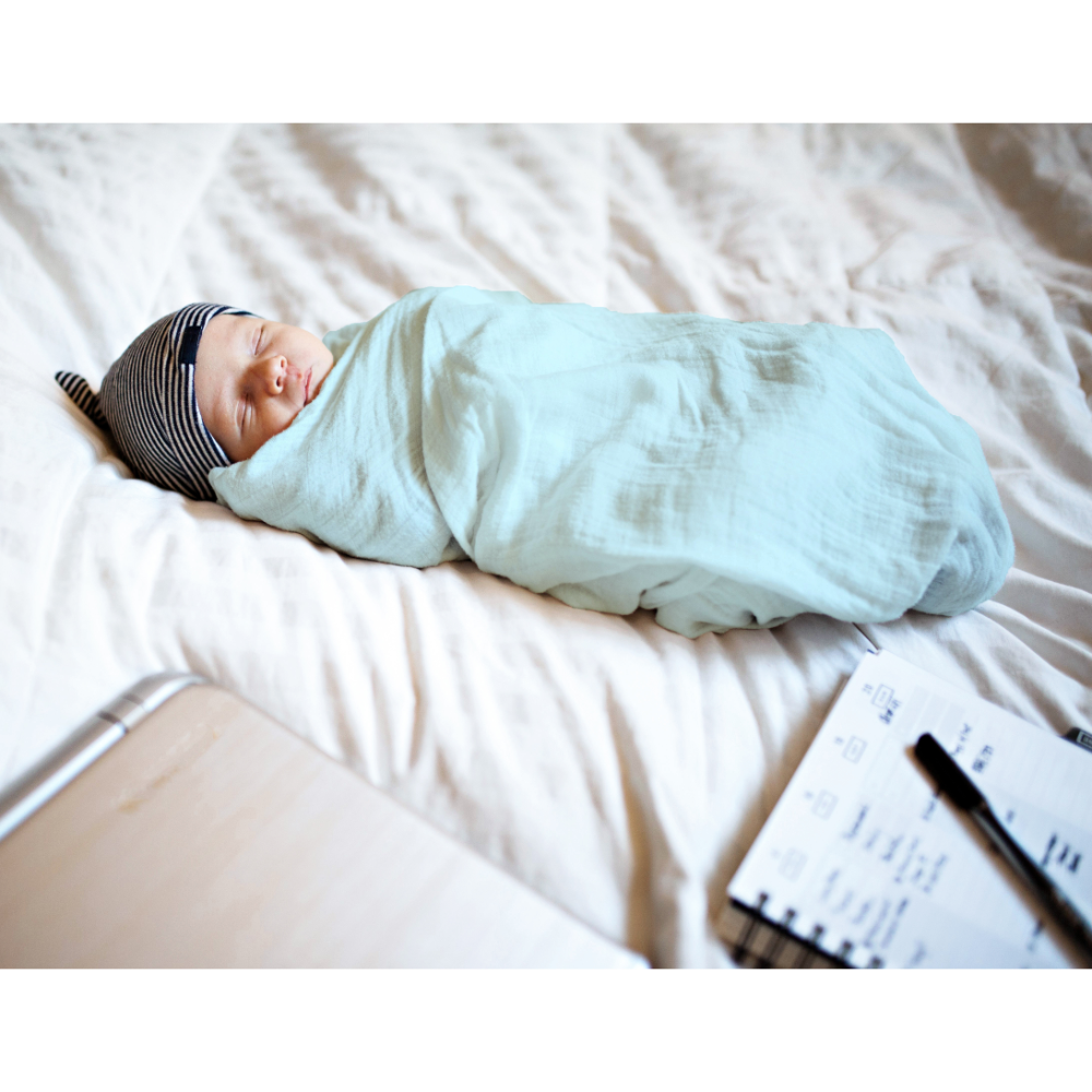 The White Cradle Swaddle Wrap - 100% Organic Cotton